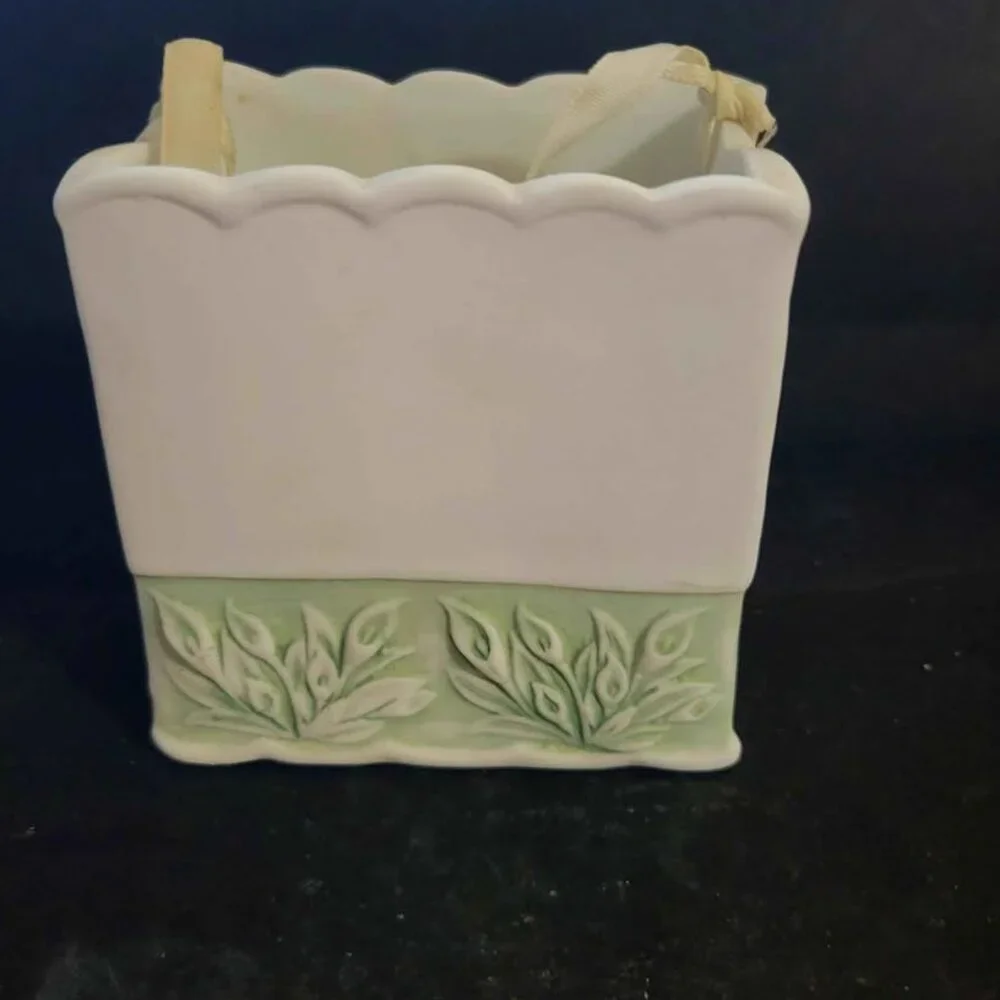 Vintage Porcelain Basket With Floral Embellishments And Decorative Ribbon
